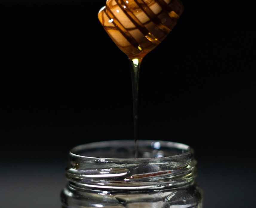brown wooden honey dipper
